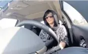  ??  ?? IN THE DRIVING SEAT: A still photograph from a video released by Loujain al-Hathloul, which shows her driving towards the Saudi border before her arrest in December 2014.