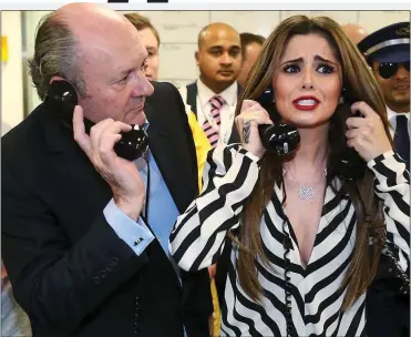  ??  ?? INVESTMENT CALL: City tycoon and Tory donor Michael Spencer with Cheryl Tweedy at a charity event