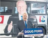  ?? BERNARD WEIL/TORONTO STAR ?? Ford unveils the Ontario PC Campaign bus and slogan at the Toronto Coach Terminal on Sunday.