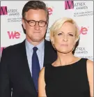  ?? The Associated Press ?? Joe Scarboroug­h and Mika Brzezinski are not only in the midst of a nasty Twitter feud with Donald Trump, they’re also being attacked in a National Enquirer story.