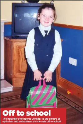  ??  ?? Off to school The naturally photogenic Jennifer is the picture of optimism and enthusiasm as she sets off to school