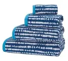  ??  ?? Rich blue hues to lift a neutral scheme, Xander towels, from £4, John Lewis