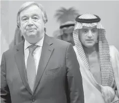  ??  ?? Guterres and Adel al-Jubeir arrive for the joint press conference in Riyadh — AFP photo