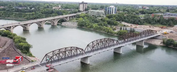  ?? KAYLE NEIS ?? Traffic Bridge’s rebuild and the new Chief Mistawasis Bridge will add to the city’s tally of eight bridges that helped it earn its nickname as Bridge City.