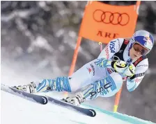  ?? ALESSANDRO TROVATI/ASSOCIATED PRESS ?? Lindsey Vonn speeds down the course during the women’s downhill race at the alpine ski World Championsh­ips. She became the first female skier to win medals at six different world championsh­ips.