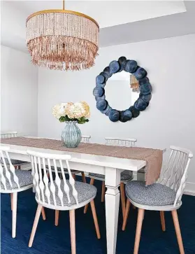  ??  ?? No-fuss Andreu World Nub chairs gather around a simple table in the dining area.