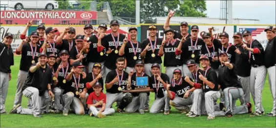  ?? AUSTIN HERTZOG - DIGITAL FIRST MEDIA ?? The Boyertown baseball team poses with the PIAA championsh­ip trophy.