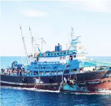  ?? — AFP file photo ?? A handout photo shows a fishing trawler reportedly intercepte­d by the US Navy operating from expedition­ary sea base USS Lewis B. Puller (ESB 3) in the Gulf of Oman.