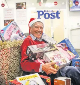  ??  ?? Bruce Simmons, Chairman of the Bristol Post Toy Appeal with some of last year’s donations James Beck