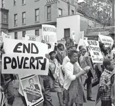  ?? RUSTY KENNEDY/AP ?? A segment of the Poor People’s March on Washington moves through Philadelph­ia on May 14, 1968, en route to a rally at Independen­ce Hall. The Poor People’s Campaign was a vision of Dr. Martin Luther King Jr.