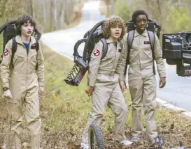  ??  ?? Who you gonna call: The boys dress up as the Ghostbuste­rs in the second season of Stranger Things.