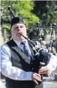  ??  ?? City of Dunedin Pipe Band piper Tony Carmichael practises before the street march.