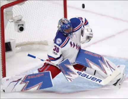  ?? RYAN REMIORZ — CANADIAN PRESS VIA AP ?? Rangers goalie Henrik Lundqvist makes a save against the Canadiens during New York’s Game 1 victory on Wednesday.