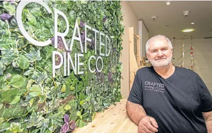  ??  ?? Don Tait, 61, of Crafted Pine Co inside the new premises at the Overgate Shopping Centre in Dundee.