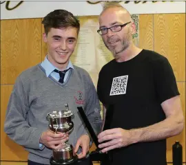  ??  ?? John Paul Breen from Kiskeam who is Student of the Year was presented with the Nellie O Connor Memorial Cup by Dr. Frank O’Connor.