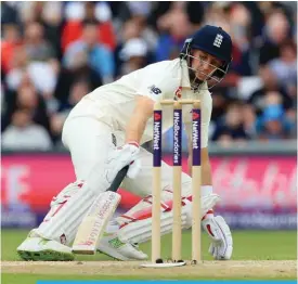  ?? AFP ?? HEADINGLY: England’s captain Joe Root makes the crease on the second day of the second Test cricket match between England and Pakistan at Headingley cricket ground in Leeds, northern England yesterday. —