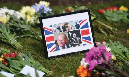  ??  ?? Flowers and messages left outside Windsor Castle in memory of Prince Philip, April 2021. Photograph: Justin Tallis/AFP/Getty Images