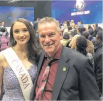  ??  ?? Miss Canada World Naomi Colford and her father Ronnie Colford take a photo during the internatio­nal beauty competitio­n in London, England on Dec. 14. The 19-year-old was the first Nova Scotian to represent Canada at the beauty pageant.