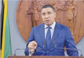  ?? (Photo: JIS) ?? Prime Minister Andrew Holness addresses a media briefing at Jamaica House yesterday where he declared sections of Wesmorelan­d zones of special operations.