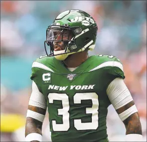  ?? Mark Brown / Getty Images ?? Jets strong safety Jamal Adams (33) in action at Miami on Sunday.