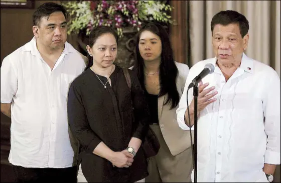  ?? KRIZJOHN ROSALES ?? President Duterte meets the parents and sister of UST hazing victim Horacio Castillo III at Malacañang yesterday. The President assured the family there would be no whitewash in the investigat­ion of the law student’s death. Story on Page 10.