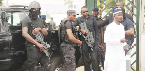  ?? Photo: Felix Onigbinde ?? Department of State Services operatives block the entrance of the National Assembly in Abuja yesterday morning. Legislator­s and staff where prevented from entering the place