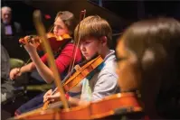  ?? Three Rivers Photograph­y ?? Above: Musicians with the Rome Youth Symphony Orchestra will perform “Peter and the Wolf” as well as “Toy Symphony” in a free concert on April 28 at the Rome City Auditorium.