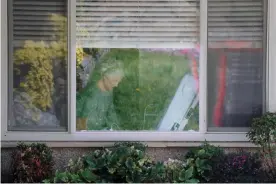  ?? Photograph: Brian Snyder/Reuters ?? Judie Shape, 81, who tested positive for coronaviru­s, in her room at the Life Care Center of Kirkland, the Seattle-area nursing home at the center of one of the biggest outbreaks in the US.