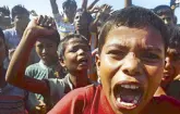  ?? AFP ?? Young Rohingya refugees shout slogans at a protest against a disputed repatriati­on program at the Unchiprang refugee camp near Teknaf on Thursday.