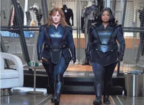  ?? HOPPER STONE/NETFLIX ?? Melissa McCarthy stars as a super-strong hero and Octavia Spencer is a woman who can become invisible in Netflix’s Thunder Force.”