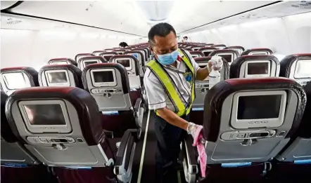  ?? — aZhar MahFOF/The star ?? as part of heightened safety measures to curb Covid-19, the interior of aircraft is regularly cleaned and disinfecte­d.