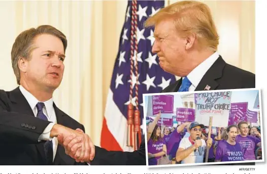  ?? AFP/GETTY ?? President Trump shakes hands Monday with his Supreme Court choice, 53-year-old U.S. Court of Appeals Judge Brett Kavanaugh, whose choice spurred protest (inset) outside the high court.