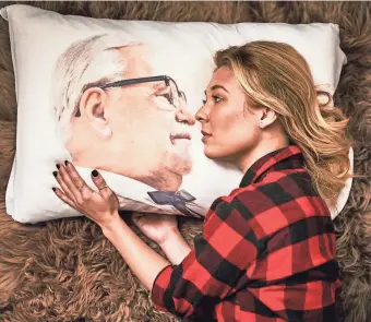  ?? KFC ?? You, too, can spend your evenings with Col. Sanders by way of this $14 pillowcase.