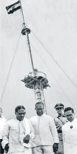  ??  ?? AUGUST 15, 1975: Chief Minister M. Karunanidh­i with State Chief Secretary P. Sabanayaga­m after unfurling the national flag at Fort St. George. The year before, he had won for all Chief Ministers the right to unfurl the national flag on Independen­ce Day.