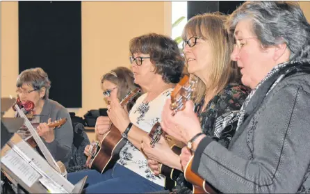  ?? SAM MACDONALD/THE NEWS ?? Members of Uke Can Duet perform at the Merigomish School House Community Centre before receiving the Ed Bowden Community Wellness Award on Feb. 22.