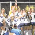  ?? KARL MERTON FERRON | THE BALTIMORE SUN ?? Severna Park teammates react after the game-winning goal against Garrison Forest by midfielder Ava Drexler-Amey (15).