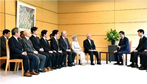  ??  ?? Abe (right) meets family members of victims abducted to North Korea at the Prime Minister’s official residence in Tokyo, Japan. — Reuters photo