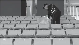  ??  ?? During these Olympics, South Korea is depending on elderly workers to clean arena seats and bathrooms.