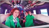  ?? ZHAO GE / XINHUA. ?? Chinese visitors to Kazakhstan sit in a stretch limo at the ChinaKazak­hstan Horgos Internatio­nal Border Cooperatio­n Center in April. Both countries hope to expand tourism across the border.