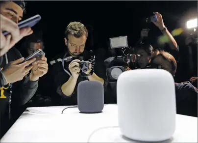  ?? AP PHOTO ?? The HomePod speaker is photograph­ed in a showroom during an announceme­nt of new products at the Apple Worldwide Developers Conference Monday in San Jose , Calif.