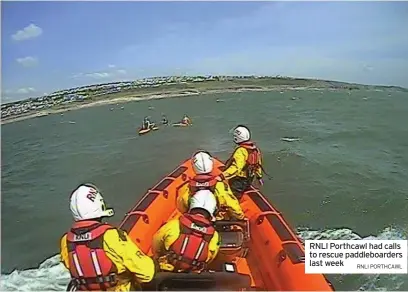  ?? RNLI PORTHCAWL ?? RNLI Porthcawl had calls to rescue paddleboar­ders last week