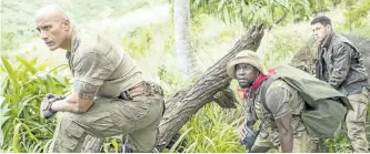  ?? WENN.COM ?? From left to right, Dwayne Johnson, Kevin Hart, and Nick Jonas in a scene from Jumanji: Welcome to the Jungle, which opens on Dec. 20.