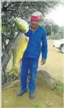  ??  ?? FISH MEAL: A farmworker with a largemouth yellowfish