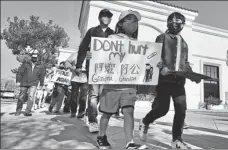  ?? XINHUA ?? People attend a rally against racism and violence facing Asian Americans in Gabriel Valley, Los Angeles, in March last year.