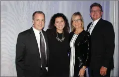  ?? (NWA Democrat-Gazette/Carin Schoppmeye­r) ?? Brian Rudisill and Allison Dolan (from left) and Mandy and Bryan Hunt help support The Jones Center at Big Night.