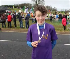  ??  ?? Joe Byrne (SBR) was delighted to medal at the All-Ireland Cross County Championsh­ips in Waterford.