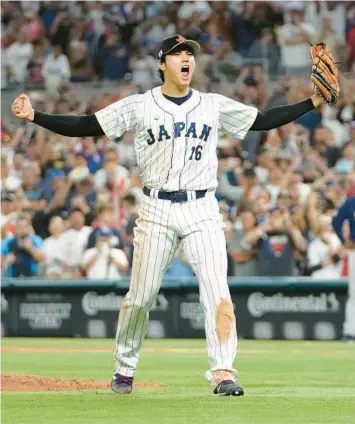  ?? ERIC ESPADA/GETTY ?? Shohei Ohtani celebrates after Japan’s victory over the U.S. in the World Baseball Classic final on Tuesday.