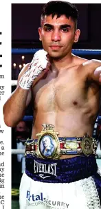  ??  ?? Unbeaten: Farooq with his belt