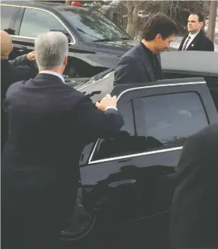  ??  ?? After meeting people at the University of Regina, Trudeau rode in a Cadillac limousine.