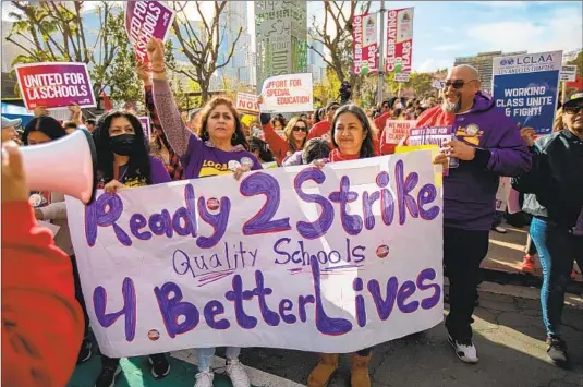  ?? LAST-MINUTE Francine Orr Los Angeles Times ?? efforts on Monday failed to avert a three-day strike that begins Tuesday for L.A. Unified. Above, workers and educators rally last week in Grand Park.